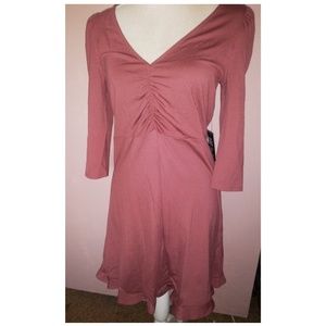 Never worn Express ruffle hem rose blush dress.  Size Medium